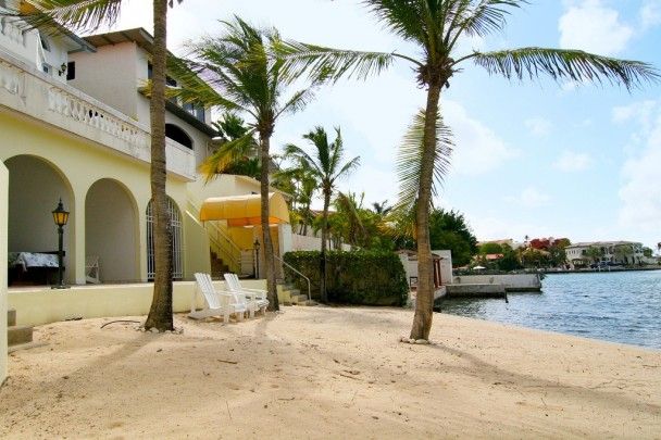 Waterfront property – private beach, boat dock, and guest house